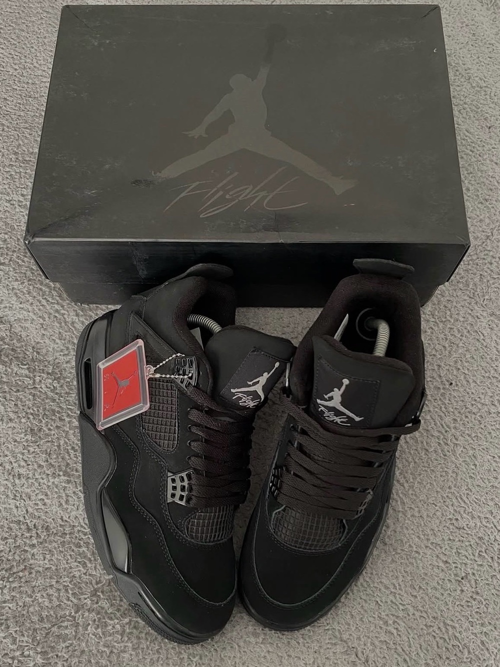 Jordan black 4 Men's Sneakers in Black with Red Hang Tag